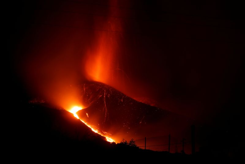 Lava and smoke rise following the eruption of a volcano