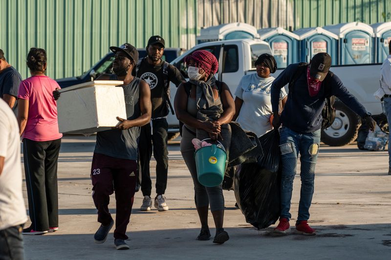 Asylum-seeking migrants in the U.S. return back to Mexican side