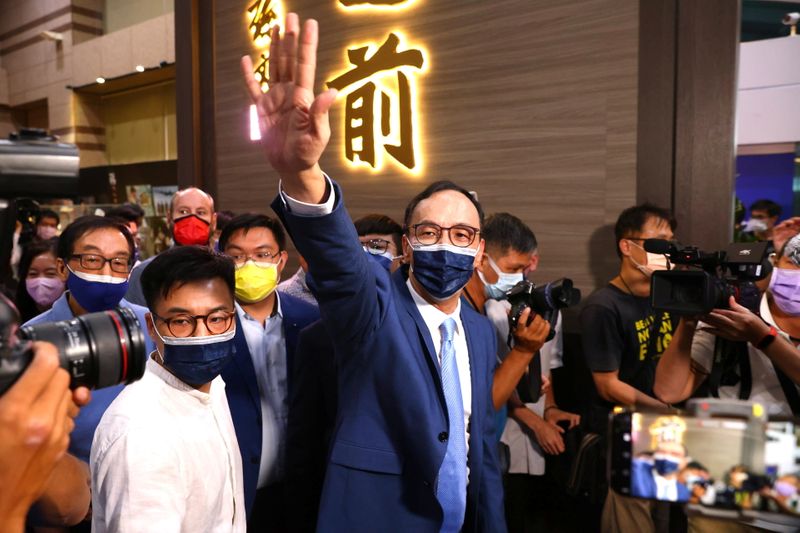 Eric Chu waves to supporters after winning chairmanship of Taiwan’s