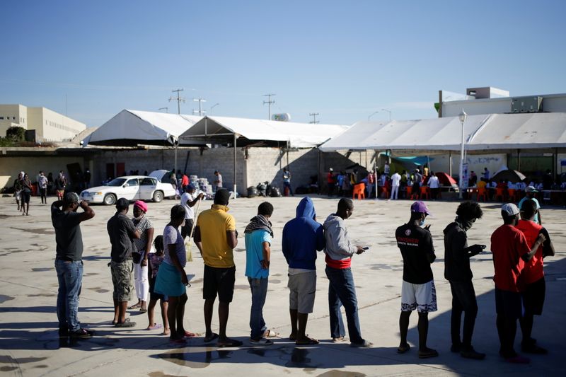 Asylum-seeking migrants in the U.S. return to the Mexican side
