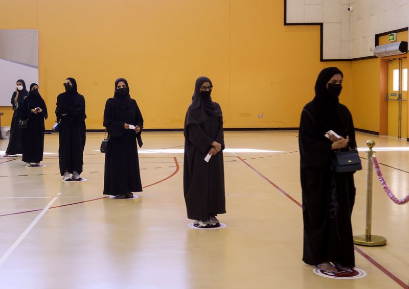 FILE PHOTO: Qataris vote in the Gulf Arab state’s first