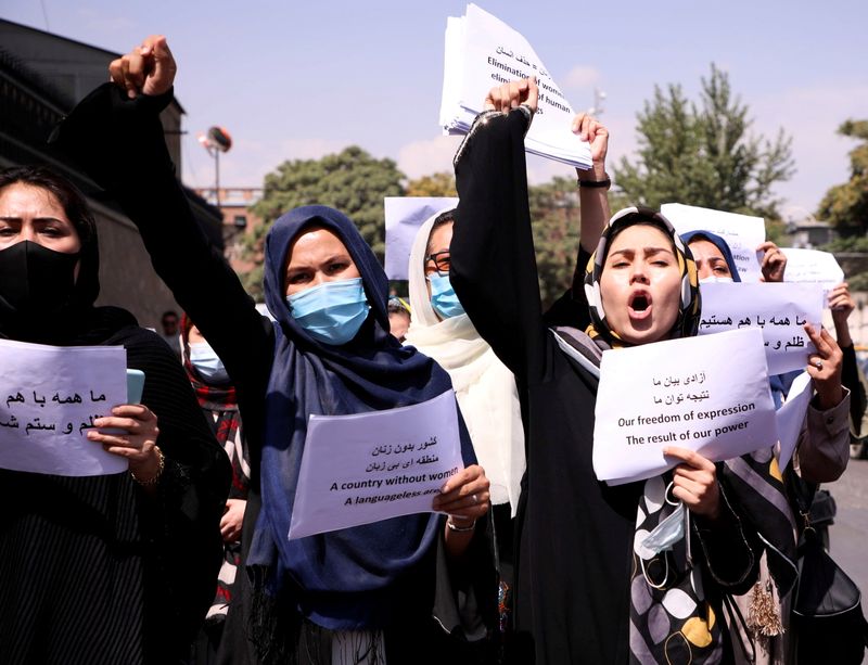 FILE PHOTO: Afghan women’s rights defenders and civil activists protest
