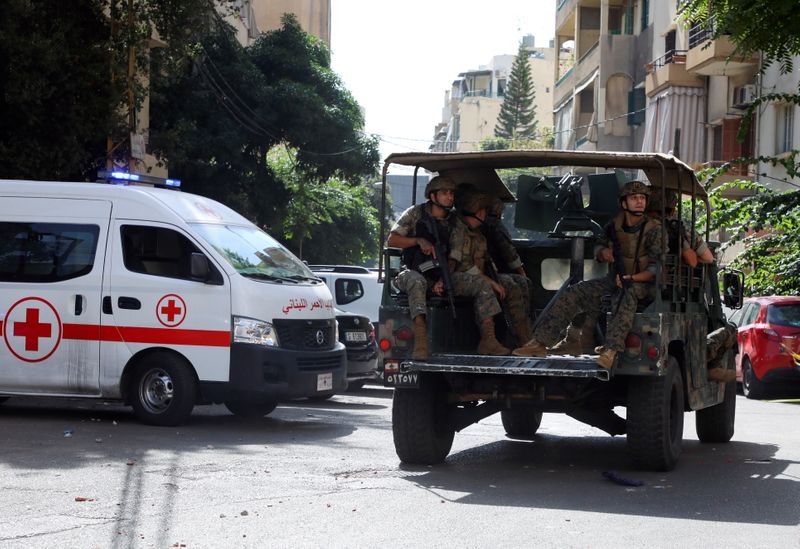 Lebanese Red Cross vehicle is pictured as army soldiers are