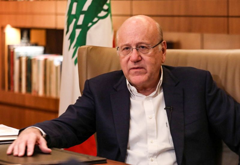 Lebanese Prime Minister Najib Mikati speaks during an interview with
