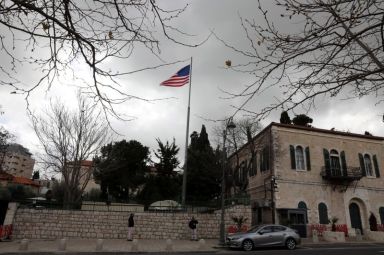 An American flag flutters at the premises of the former