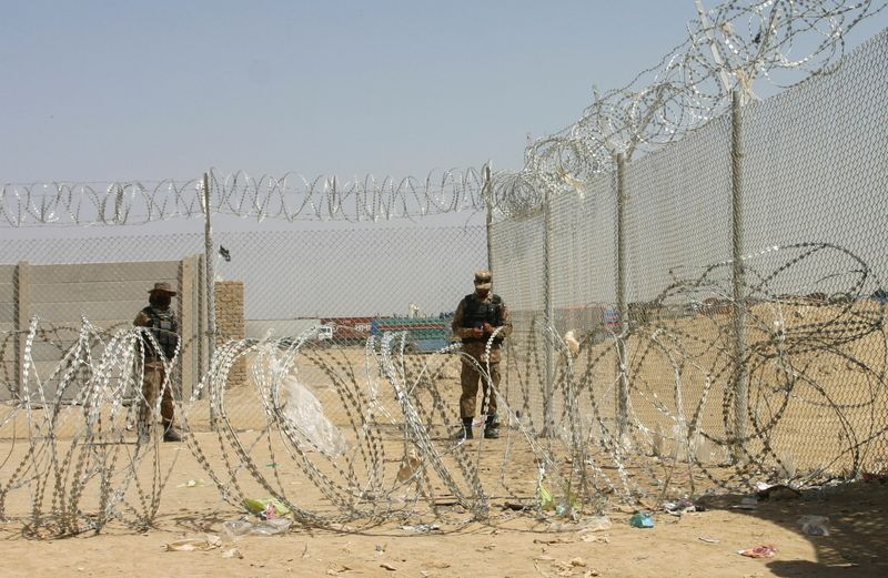 Army soldiers stand guard during a temporary closure of the
