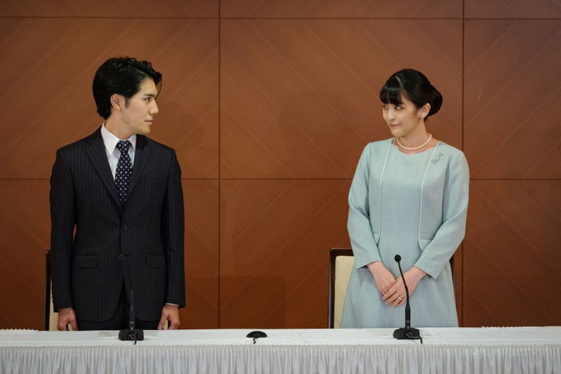 Princess Mako and Kei Komuro address a news conference in