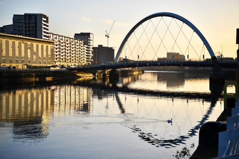 The morning sun shines on the River Clyde and the