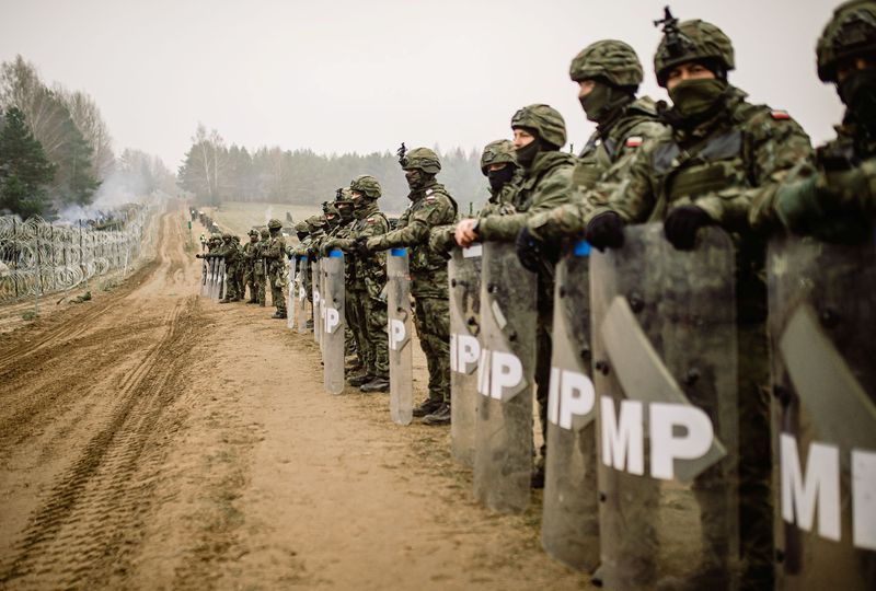 Polish military police stay on guard at the Poland/Belarus border
