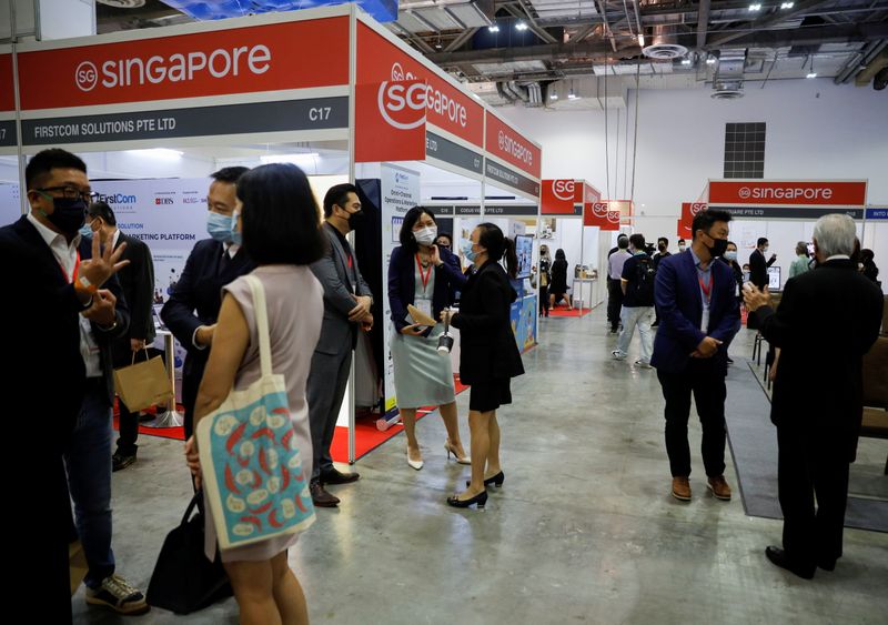 Visitors attend the Restaurants Asia and Cafe Asia trade conventions