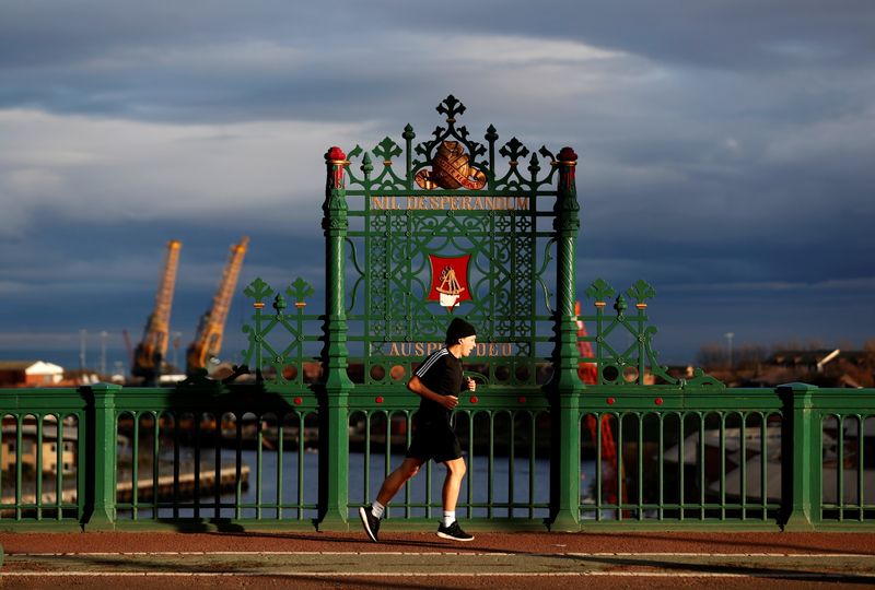 A jogger runs over the Wearmouth Bridge in Sunderland