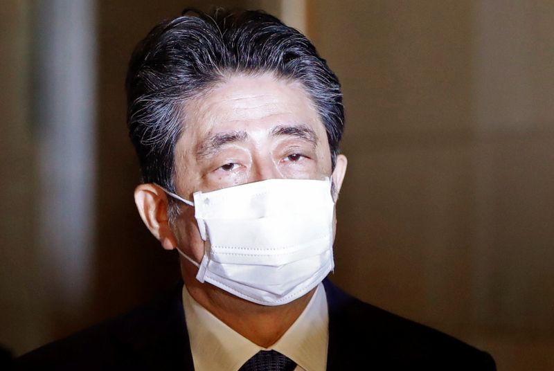 FILE PHOTO: Former Japanese PM Abe faces questioning in Tokyo
