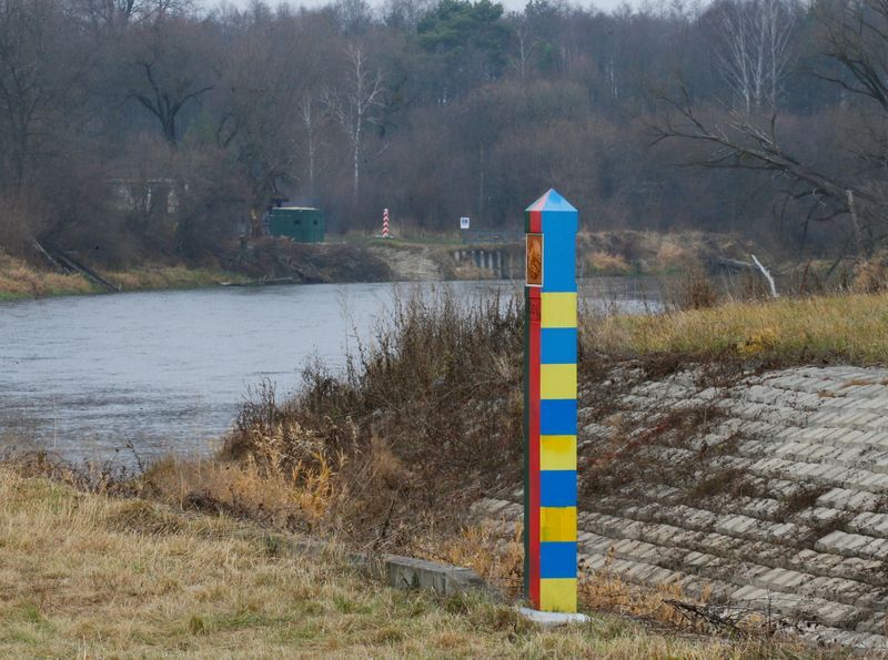 Belarusian-Ukrainian and Polish border sign posts are seen at the