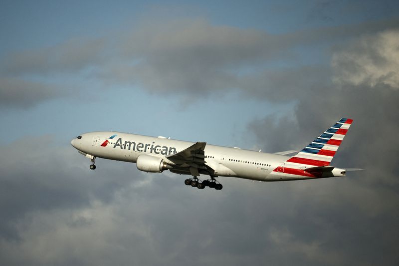 An American Airlines Boeing 777 plane takes off from Paris