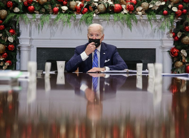 FILE PHOTO: U.S. President Joe Biden meets with members of