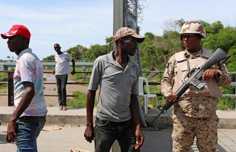 FILE PHOTO: Border security soldiers guard border control as Haitians