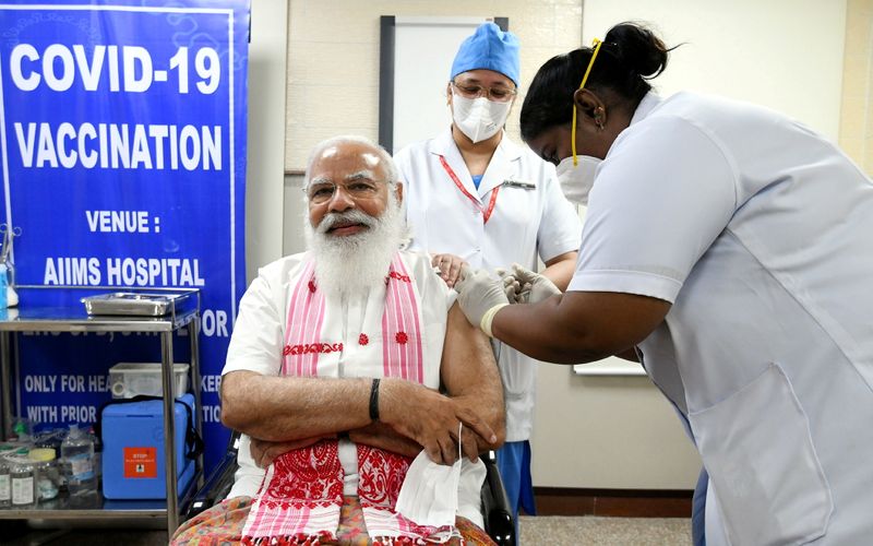India’s PM Modi receives a dose of a COVID-19 vaccine