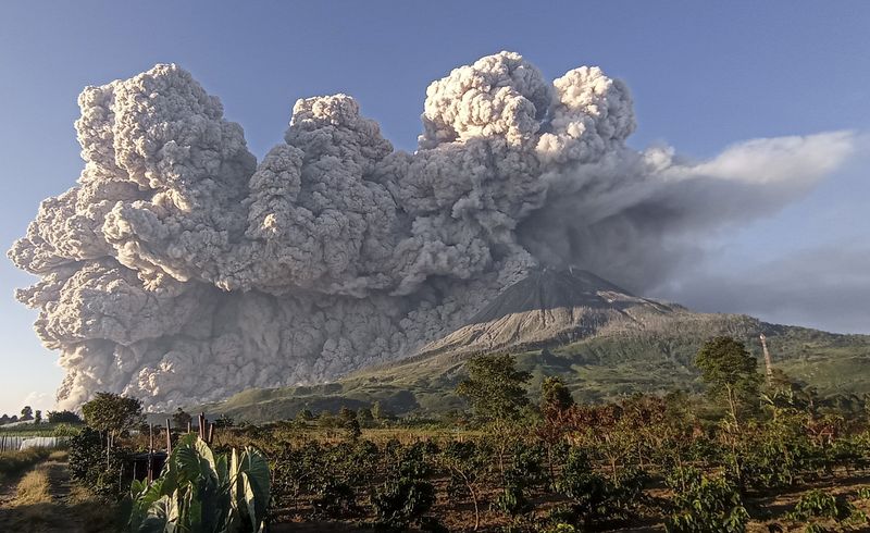 Mount Sinabung volcano erupts as seen from Kuta Rakyat village