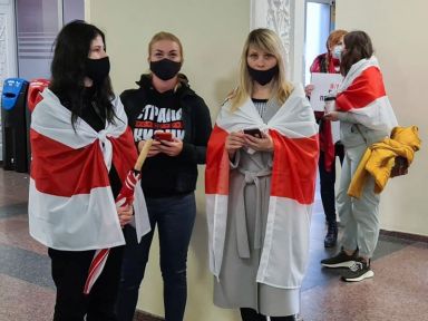 Supporters of Belarusian opposition blogger and activist Protasevich wait at