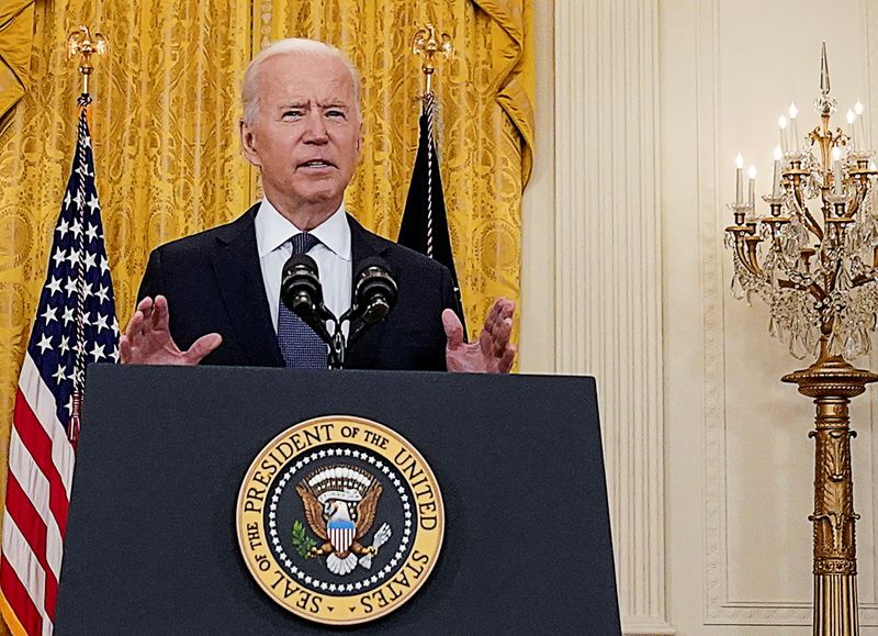 FILE PHOTO: U.S. President Biden speaks to news media at