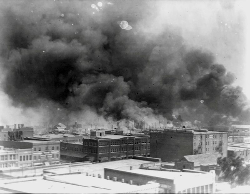 Smoke rises from buildings during the 1921 race massacre in