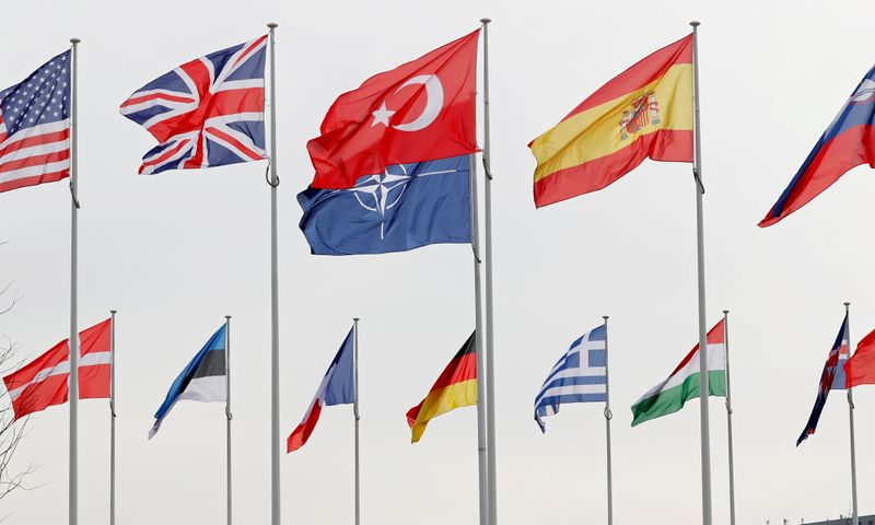 FILE PHOTO: Flags of NATO member countries flutter at alliance