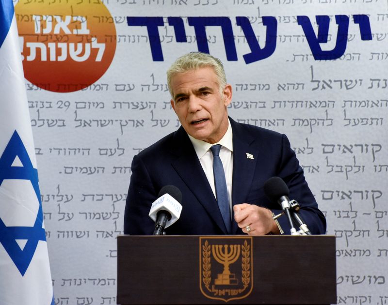 Yair Lapid, leader of Yesh Atid party, delivers a statement