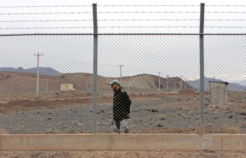 FILE PHOTO: Iranian soldier stands guard inside Natanz uranium enrichment