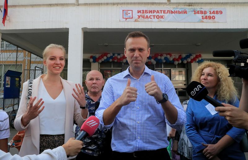 FILE PHOTO: Russian opposition leader Navalny visits a polling station