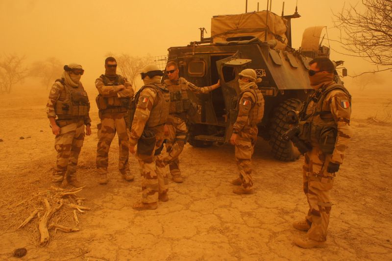 FILE PHOTO: French soldiers from Operation Barkhane stand outside their