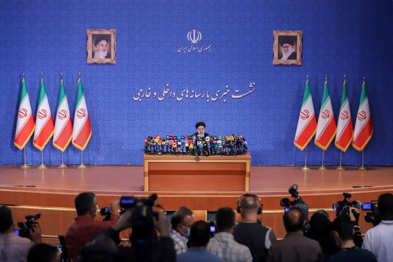Iran’s President-elect Ebrahim Raisi attends a news conference in Tehran