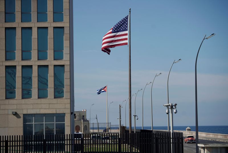 FILE PHOTO: A view of Cuban and American flags beside