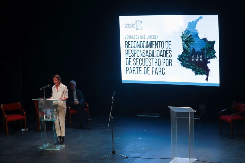 French-Colombian politician Betancourt speaks with former FARC members, Bogota