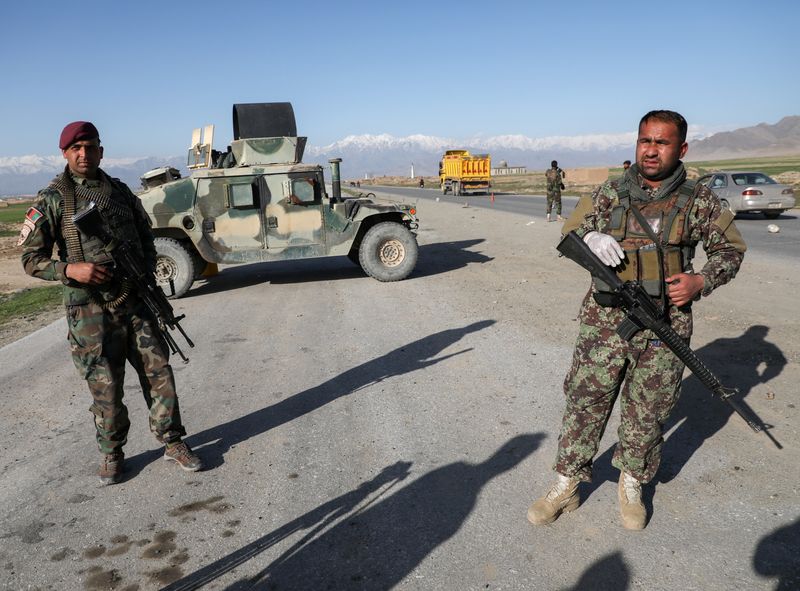 FILE PHOTO: Afghan National Army (ANA) soldiers stand guard at