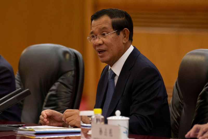 Cambodian Prime Minister Hun Sen speaks during a meeting with