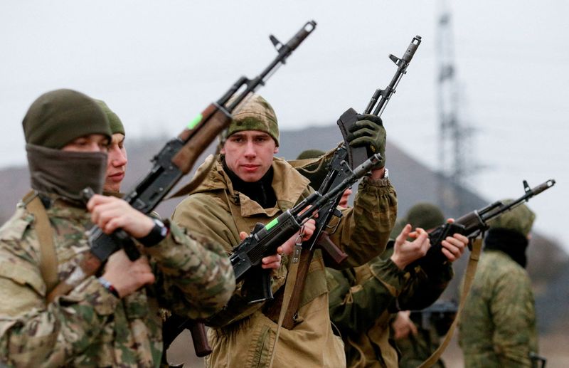 FILE PHOTO: Militants of the self-proclaimed Donetsk People’s Republic train