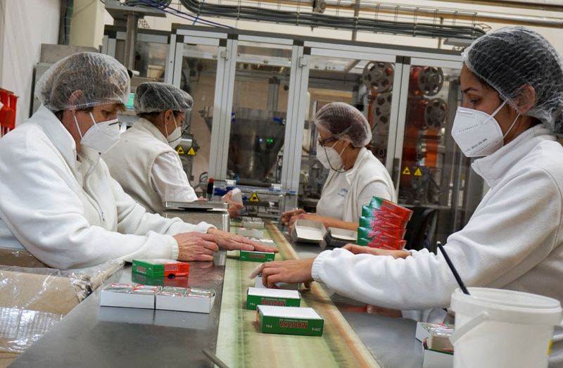 Employees work at Madeta dairy factory in Plana nad Luznici