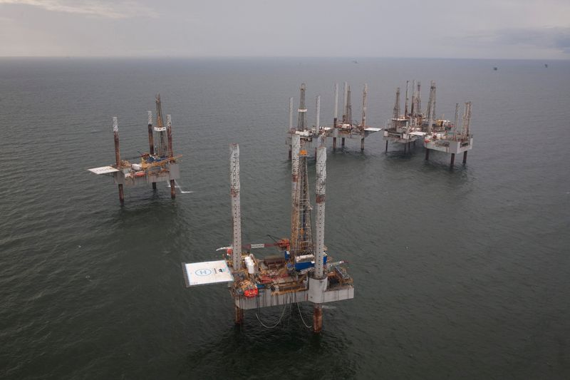 FILE PHOTO: Unused oil rigs sit in the Gulf of
