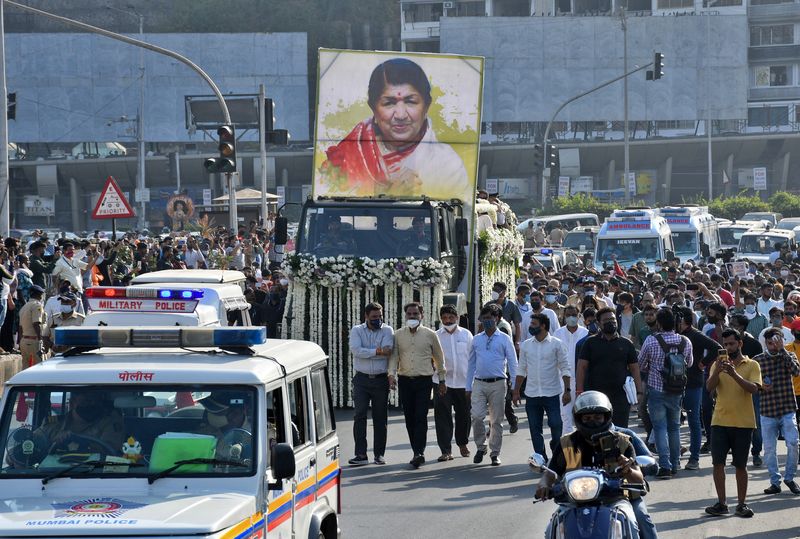 A military vehicle carrying the body of late Indian singer