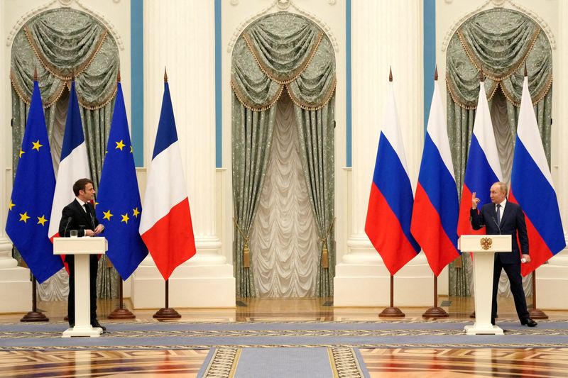 FILE PHOTO: Russian President Vladimir Putin meets with French President