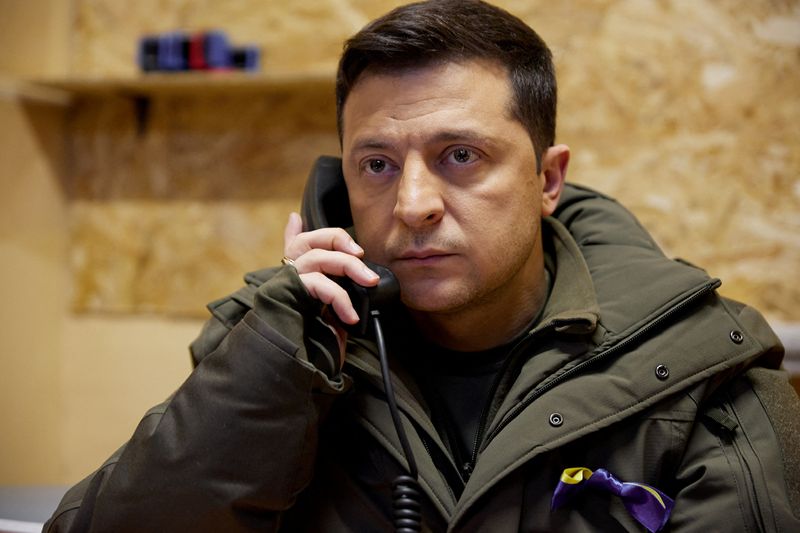 Ukrainian President Zelenskiy speaks on the phone in the Donetsk