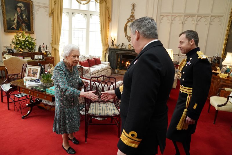 Britain’s Queen Elizabeth meets the incoming and outgoing Defence Service