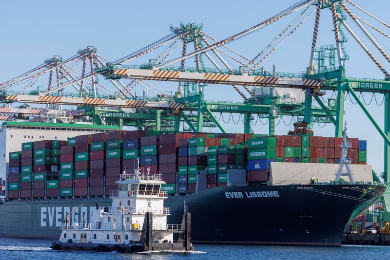 A container ship is shown at the Port of Los