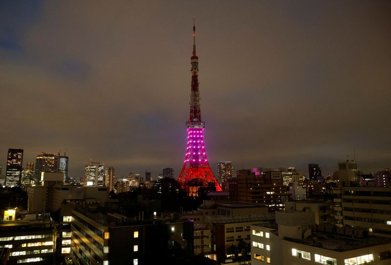 Tokyo Tower is illuminated only in the lower-half part in