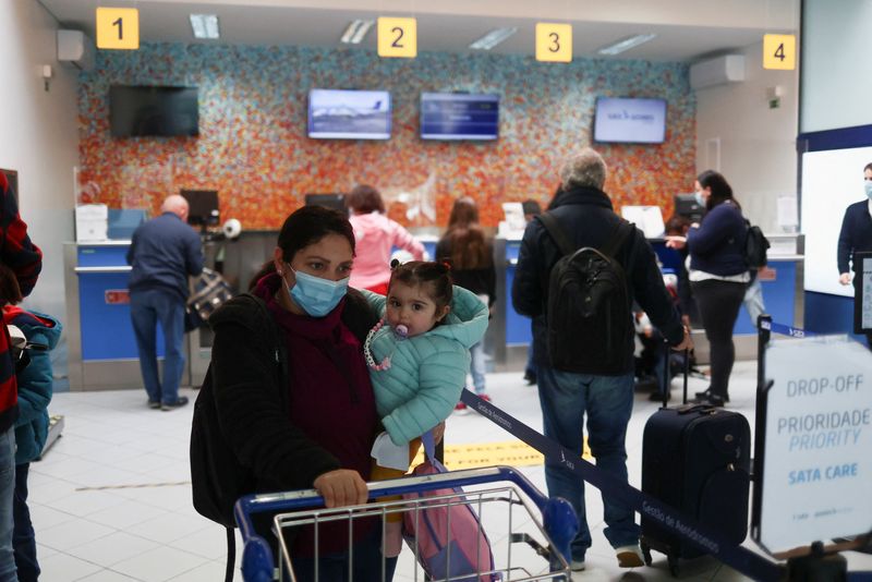 People leave Sao Jorge island on the last commercial flight