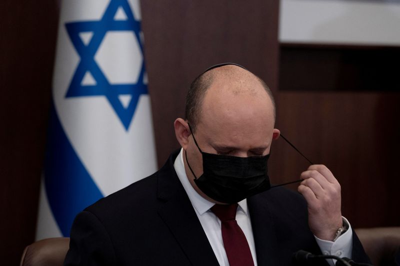 Israeli Prime Minister Naftali Bennett chairs the weekly cabinet meeting