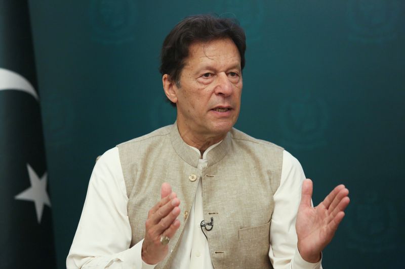 Pakistan’s Prime Minister Imran Khan gestures during an interview with