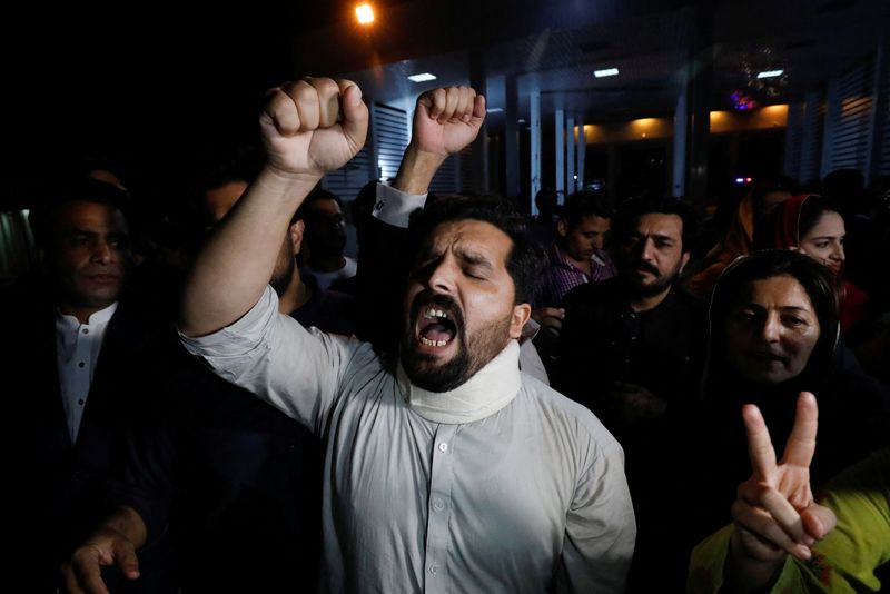 Supporters of former Pakistani Prime Minister Imran Khan chant slogans