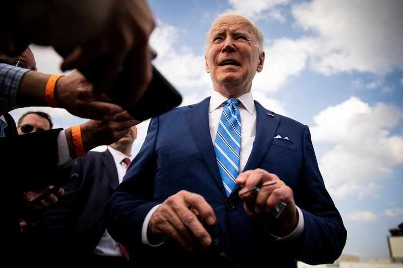 U.S. President Biden speaks to reporters while departing at Des
