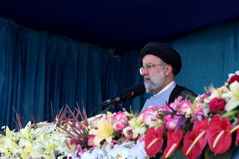 Iranian President Ebrahim Raisi delivers a speech during the ceremony